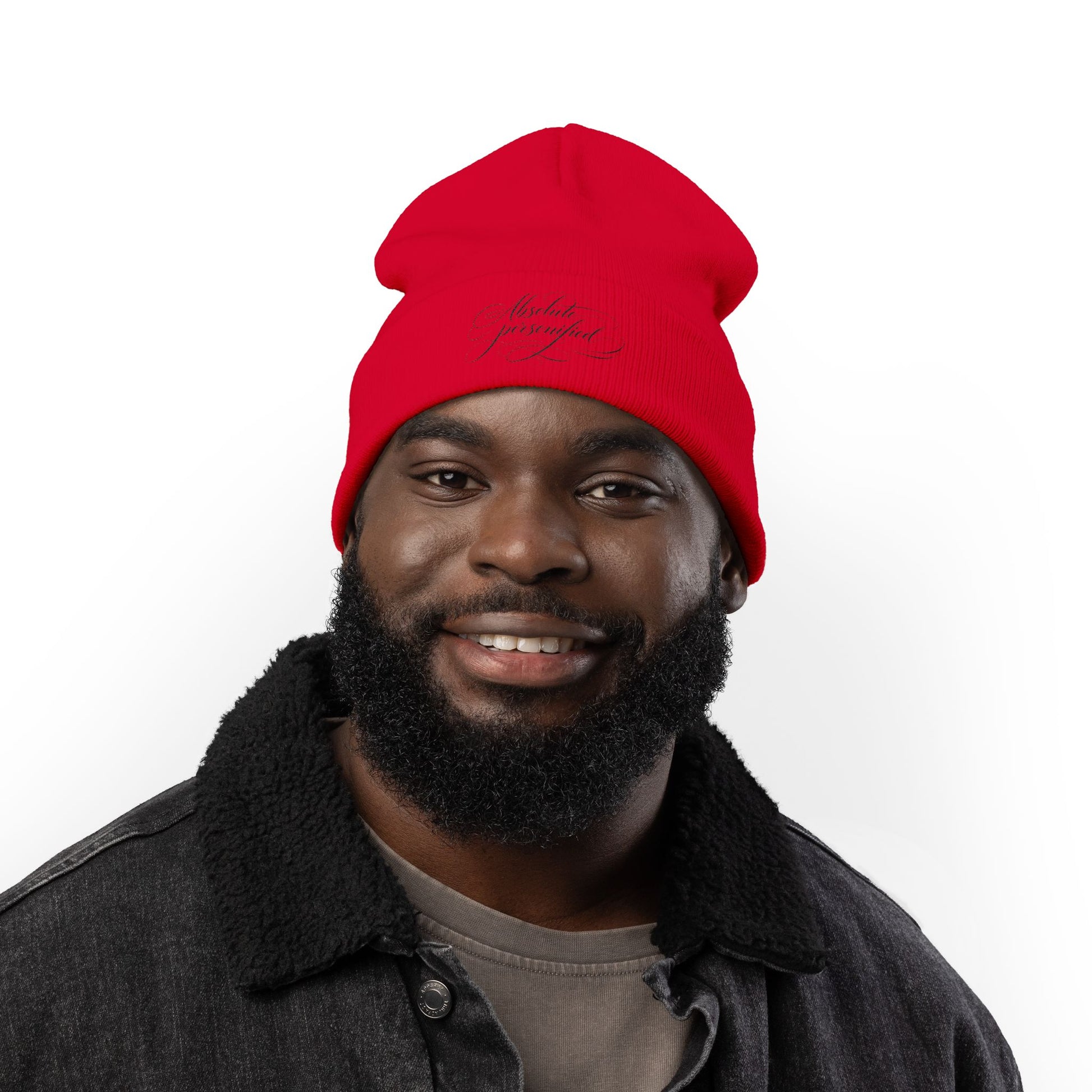 Embroidered black beanie hat with scripted "Absolute Personified" design, made by Printify, featuring a cozy knit texture.