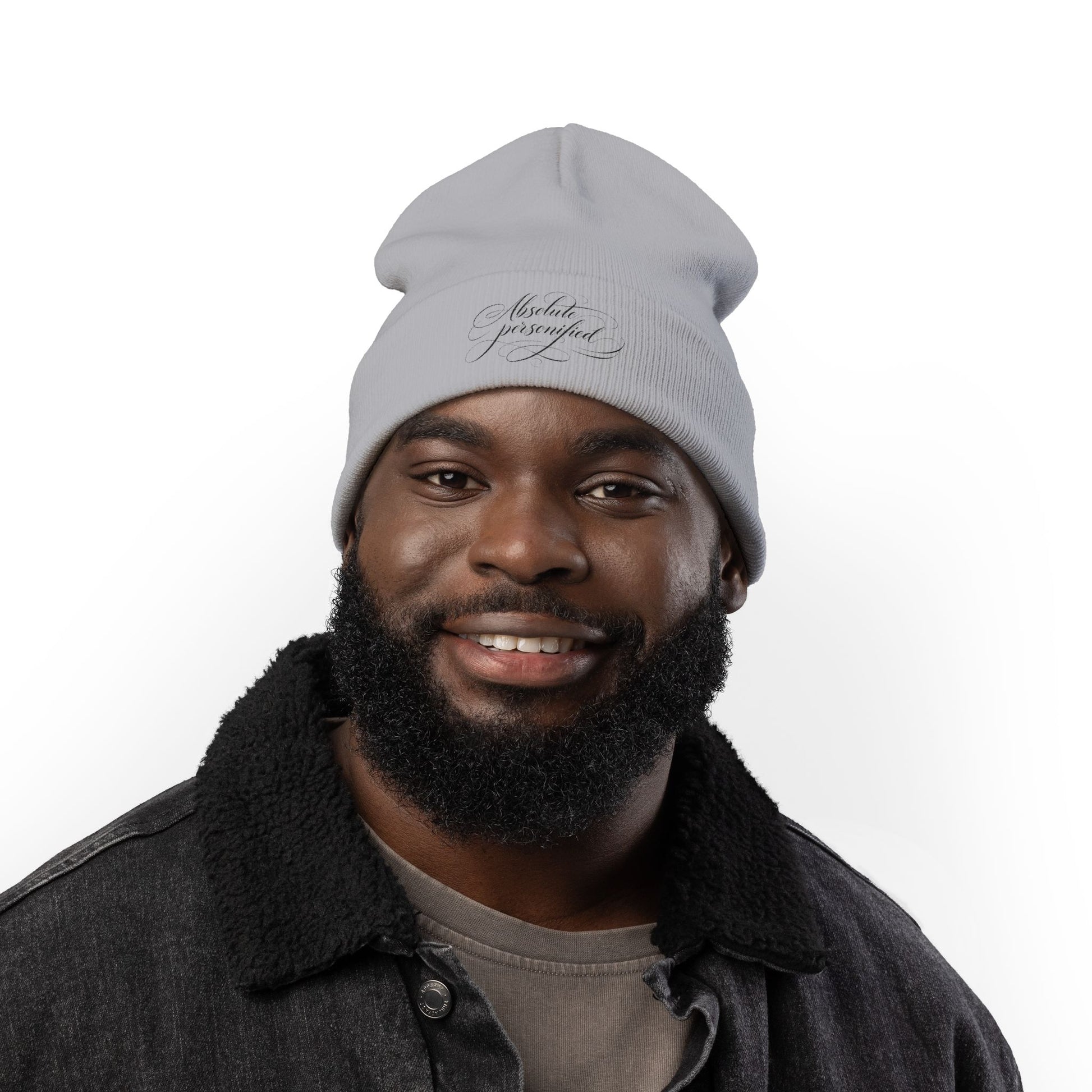 Embroidered black beanie hat with scripted "Absolute Personified" design, stylish and warm accessory from Printify.