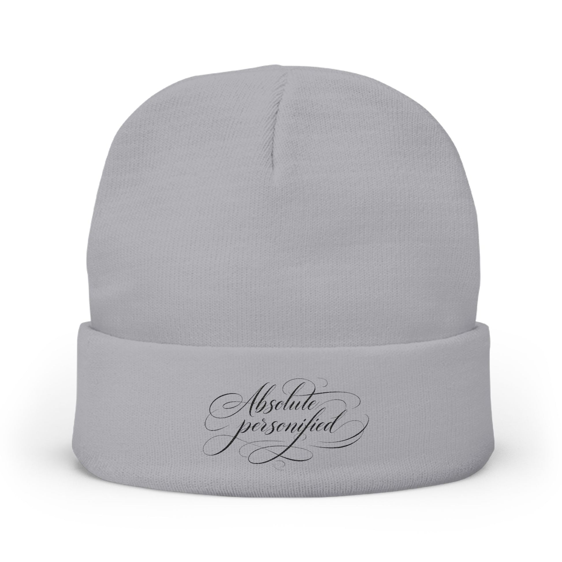 Embroidered black beanie hat with scripted "Absolute Personified" design, made by Printify, featuring a cozy knit texture.